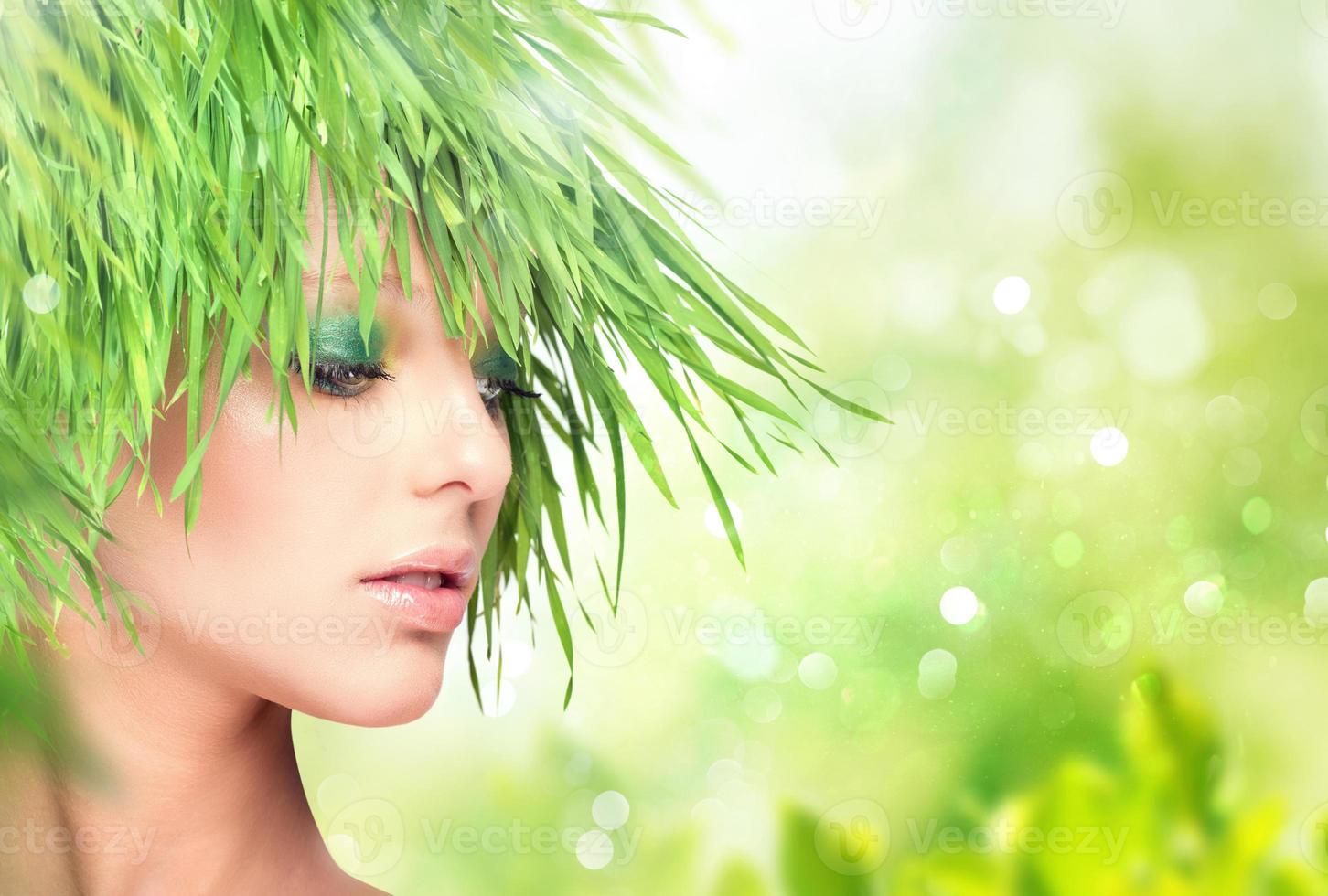 Nature beauty woman with fresh grass hair photo