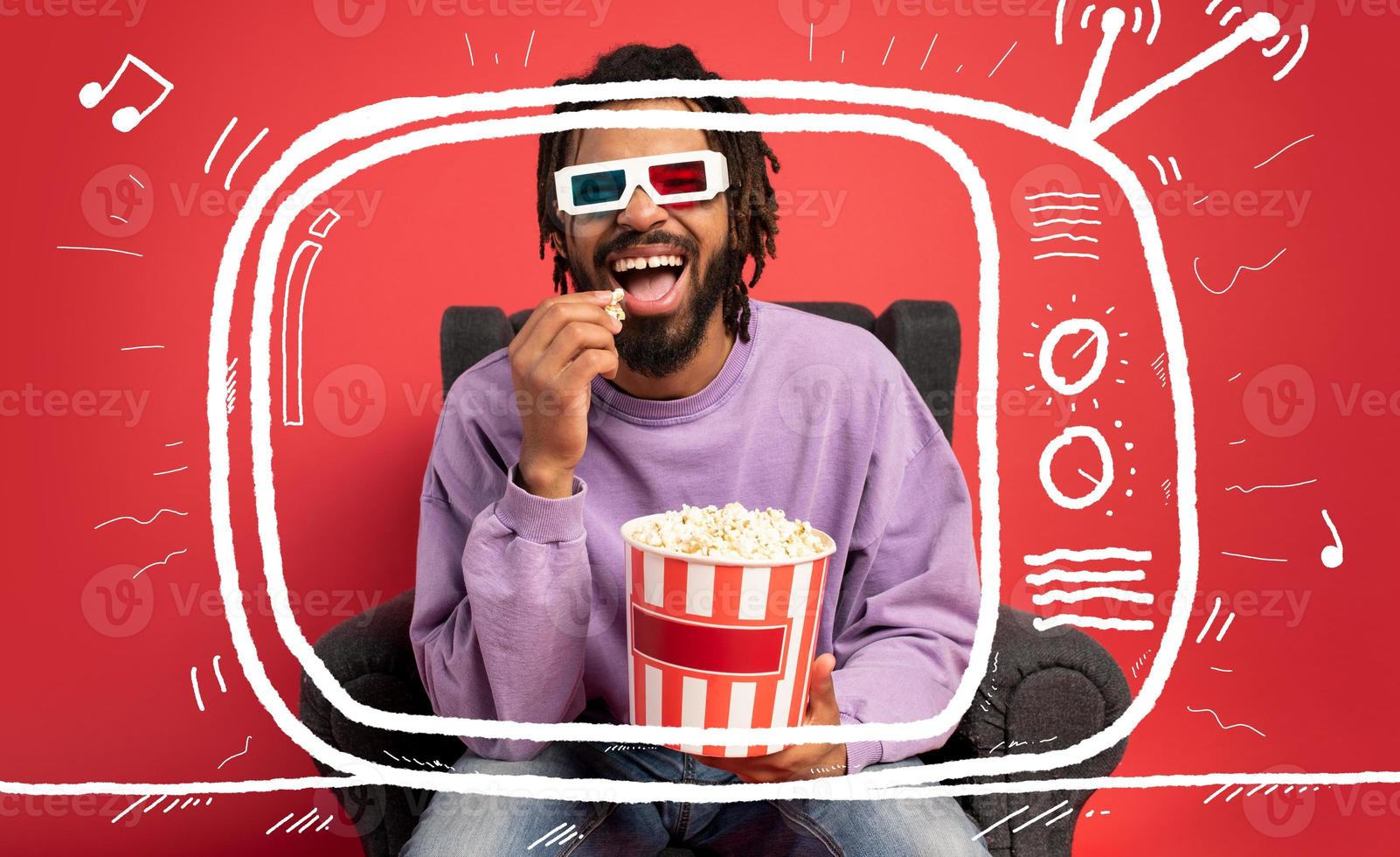 Boy has fun watching a film. Concept of entertainment and streaming tv photo