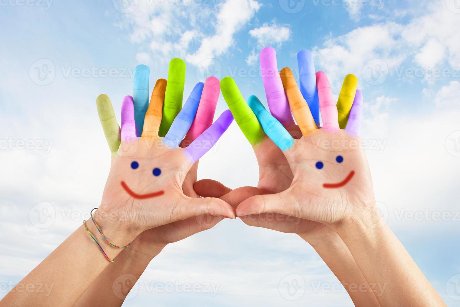 Painted hands with smile photo