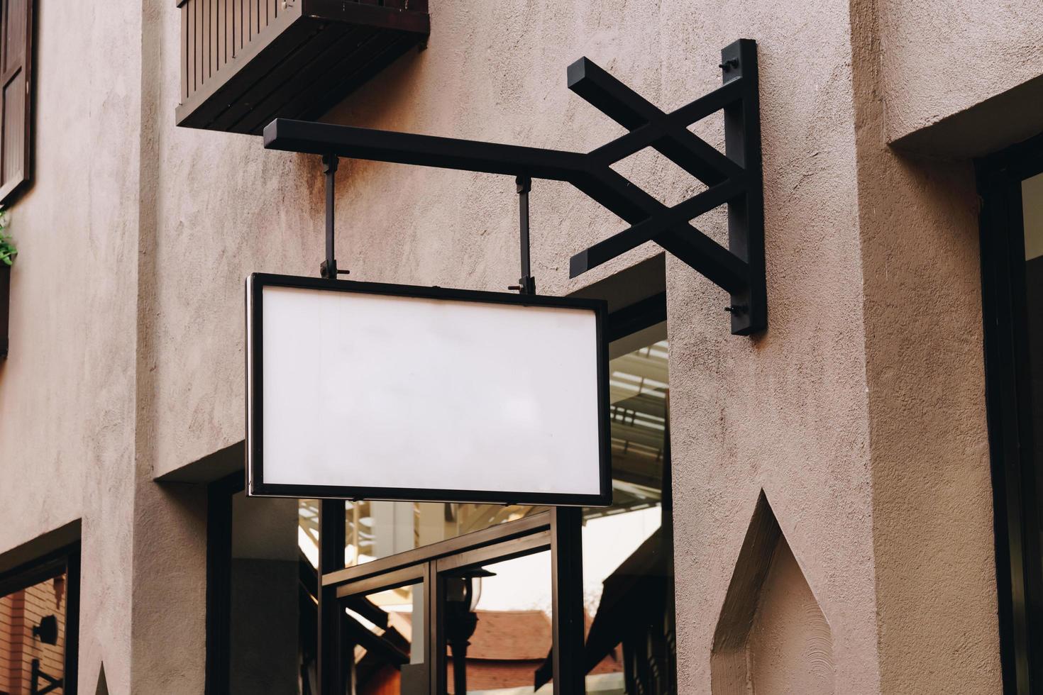 horizontal empty signage on clothes shop front with copy space. photo