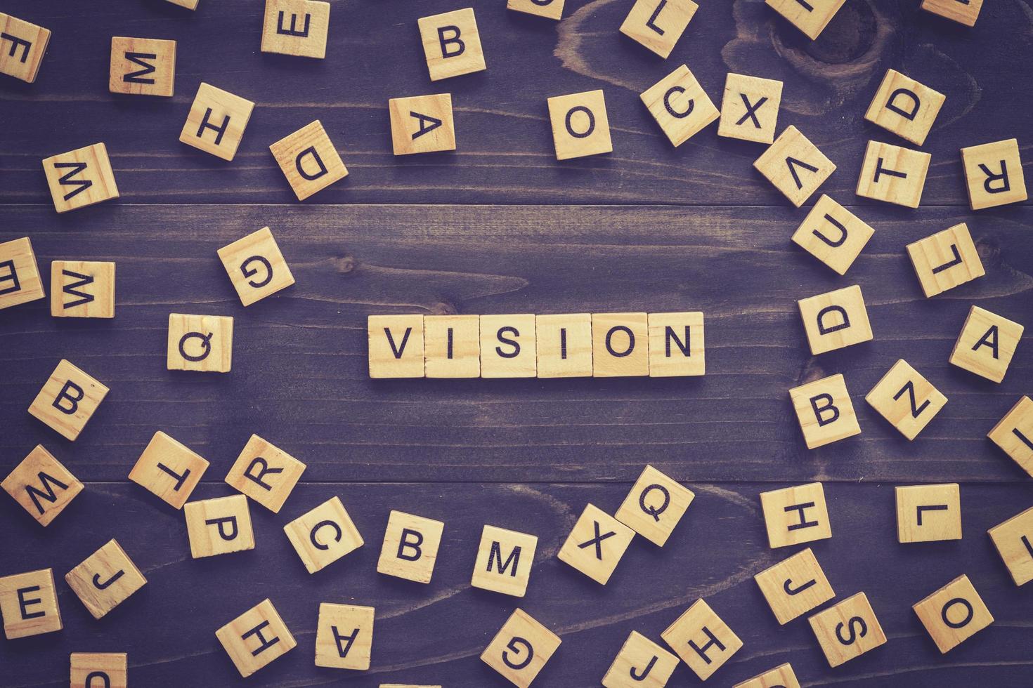 Vision word on wood table for business concept. photo