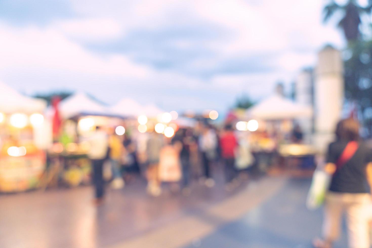 Abstract blur background in night market at shopping mall for background, Vintage toned. photo