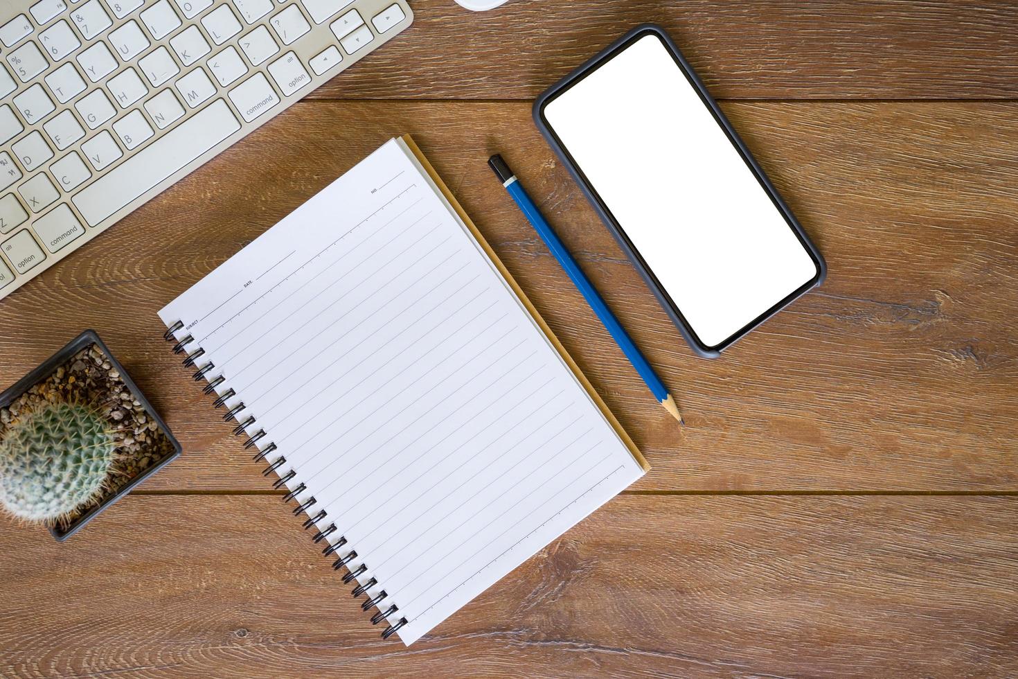 Working place. desktop, notebook, phone for table setting. photo