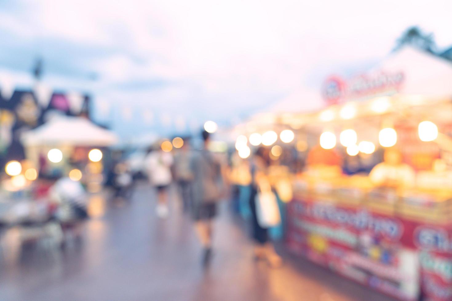 Abstract blur background in night market at shopping mall for background, Vintage toned. photo