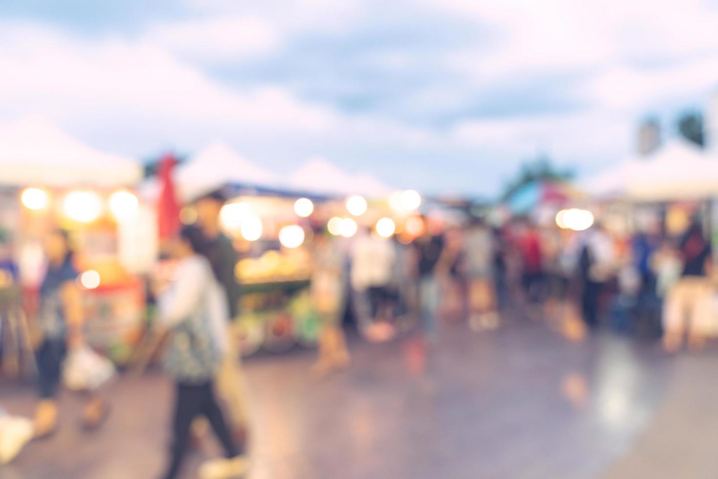 Abstract blur background in night market at shopping mall for background, Vintage toned. photo