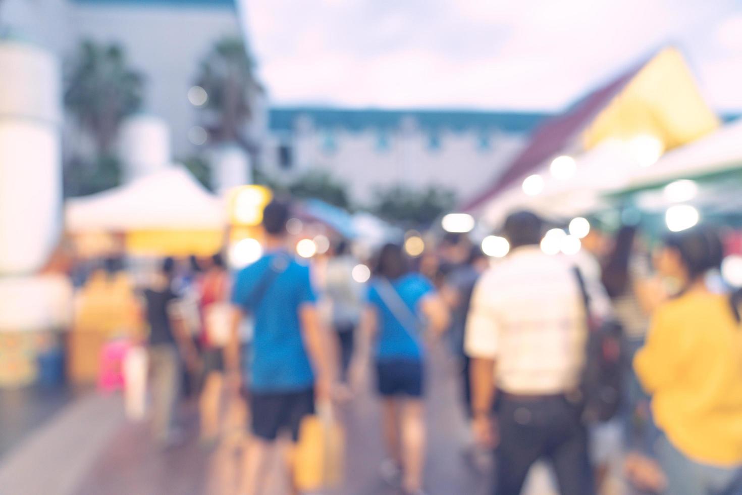 Abstract blur background in night market at shopping mall for background, Vintage toned. photo