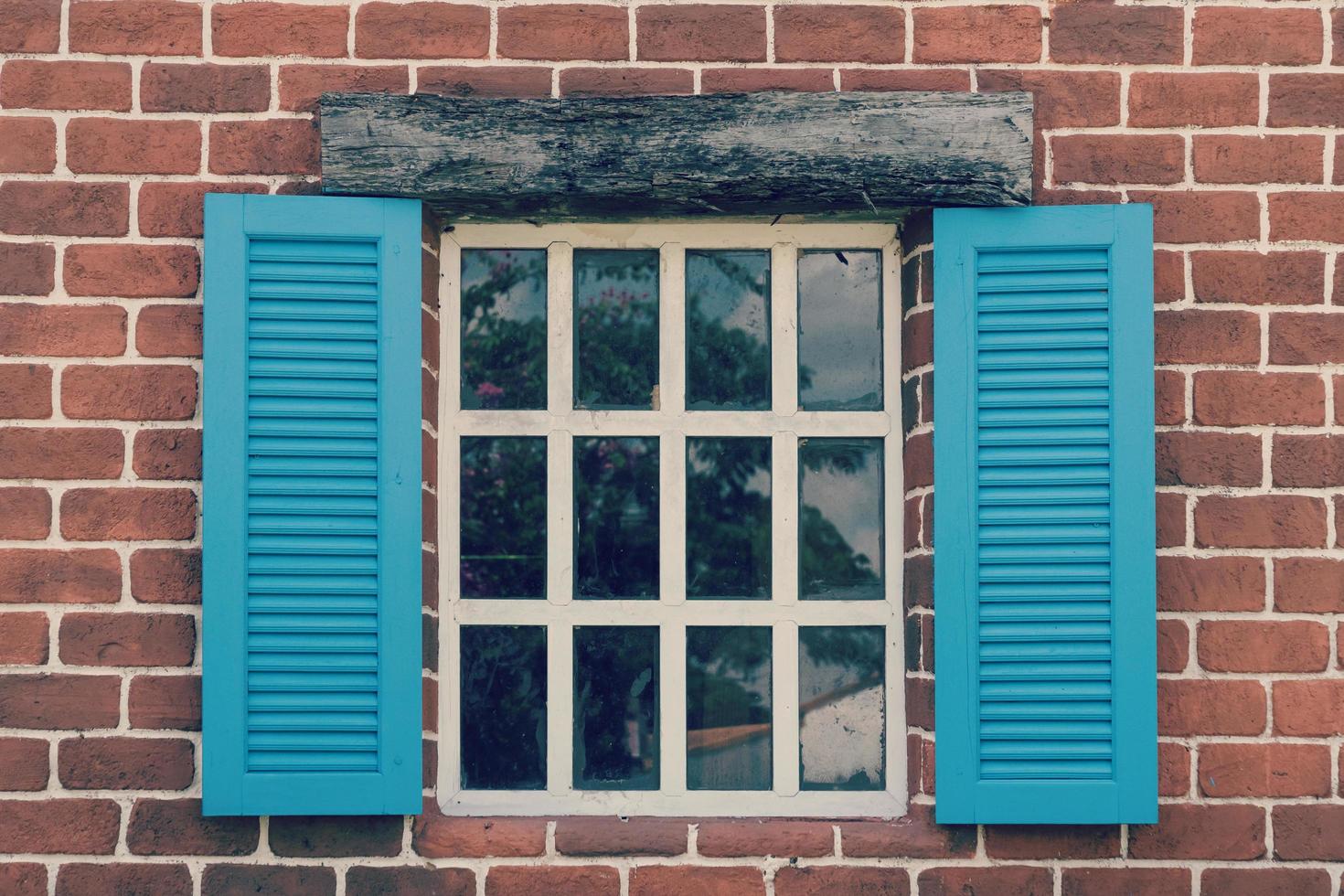 Retro a window with an arch on wooden wall photo