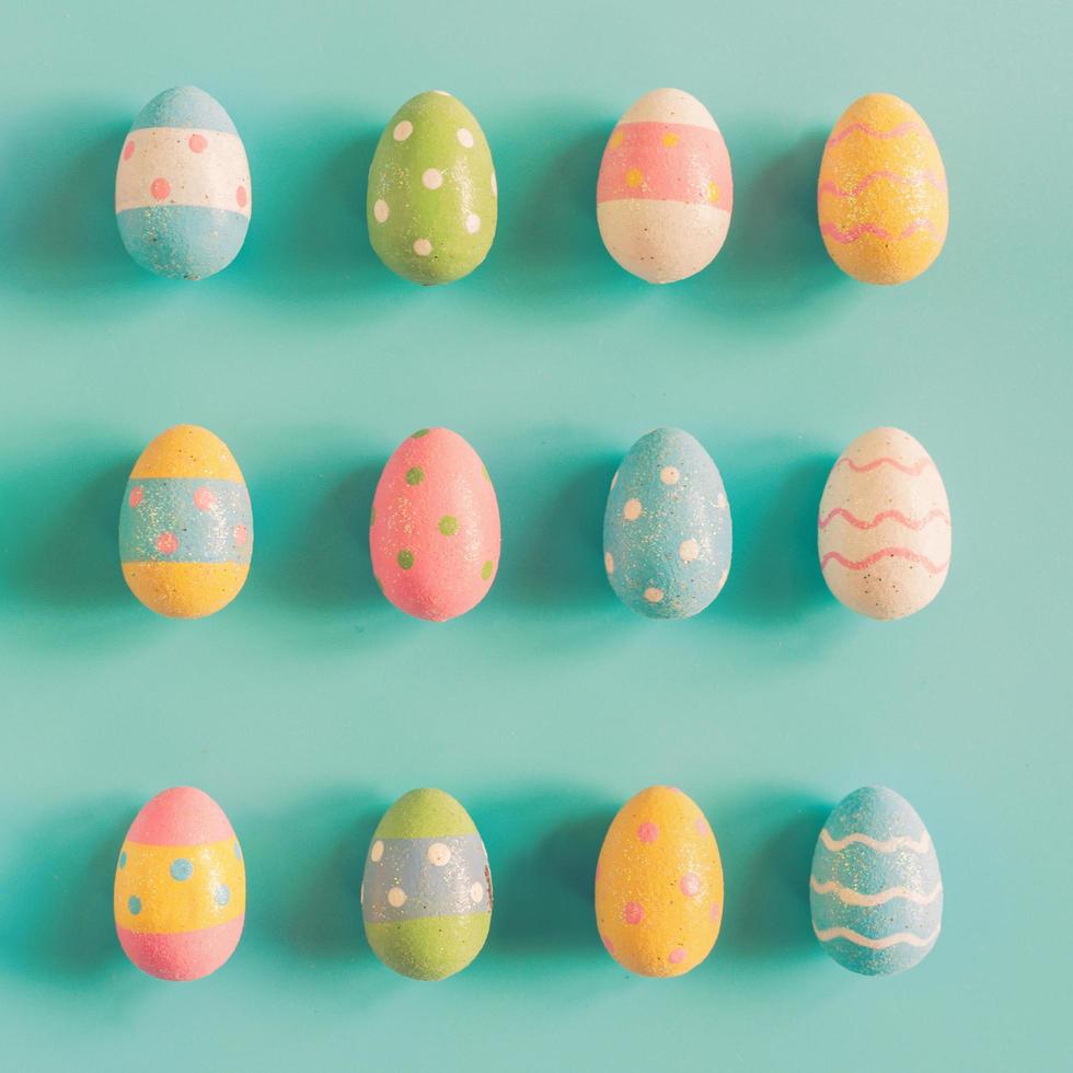 Colourful easter egg on pastel colour background photo