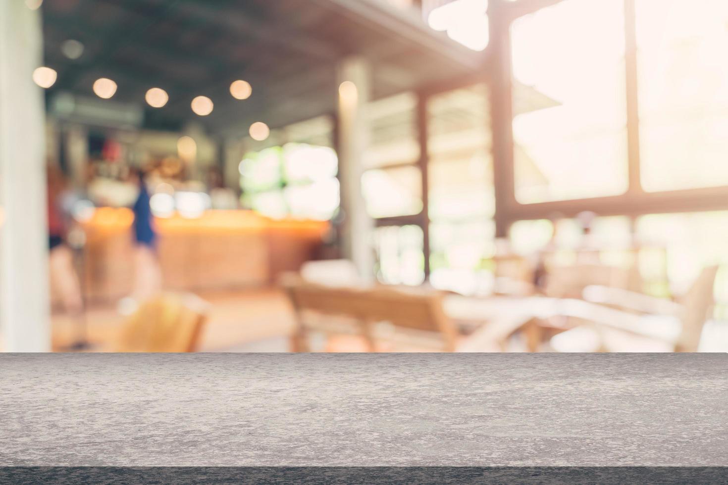 Coffee shop blur background with bokeh image . photo