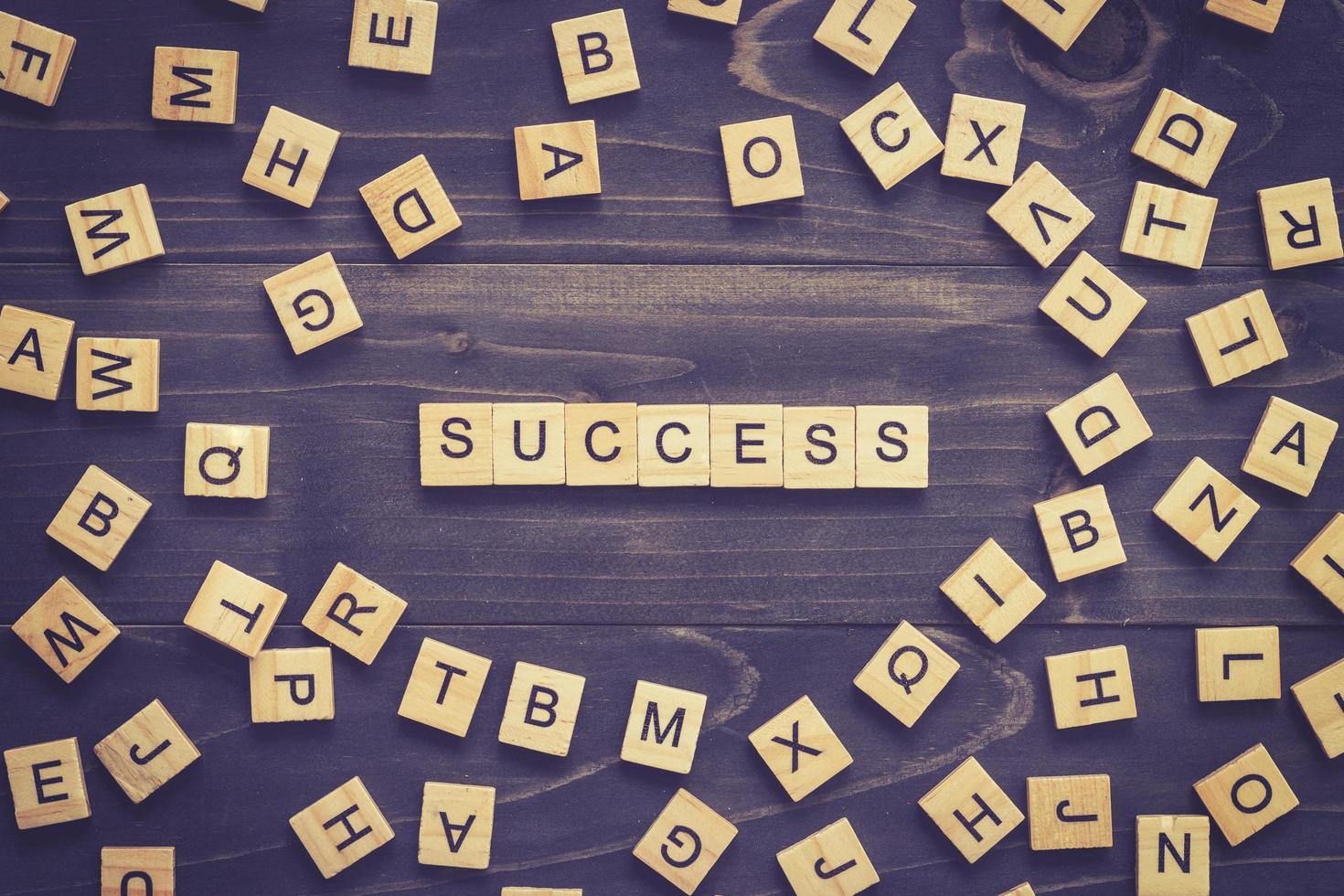 Success word on wood table for business concept. photo