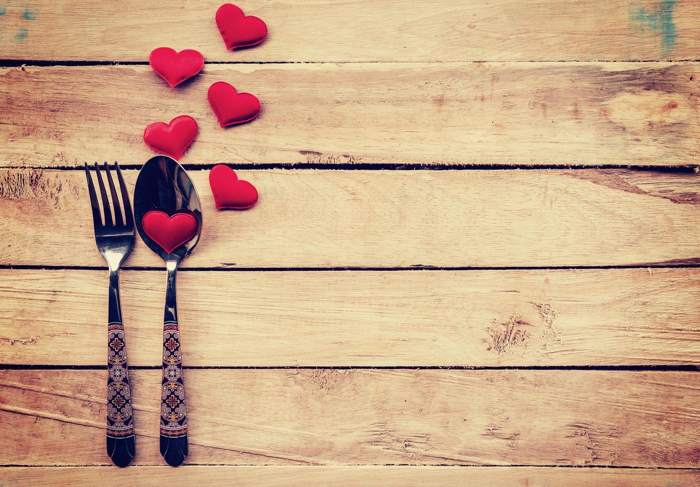 Table setting cutlery and red heart for dinner Valentine Day. photo