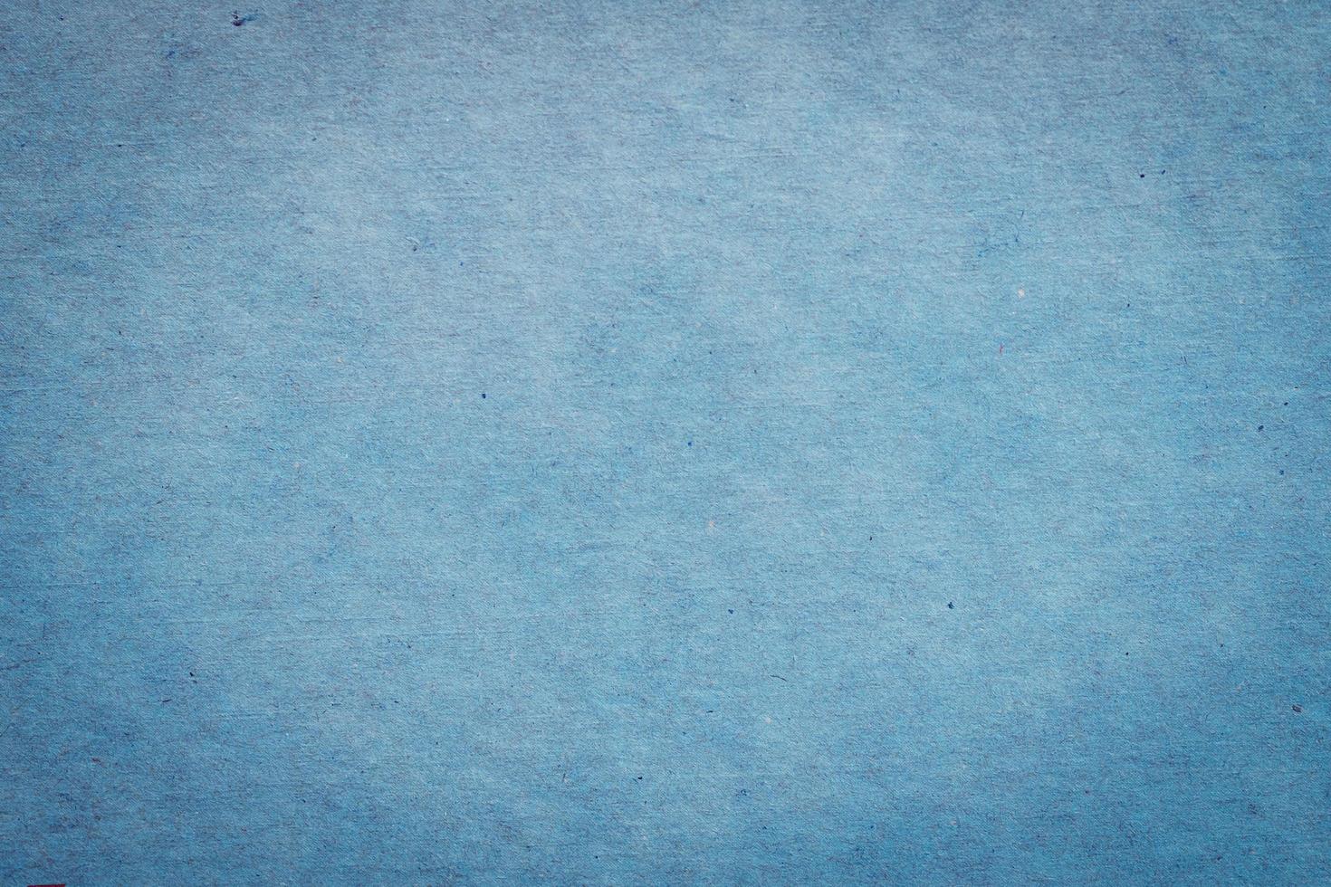 close up blue paper texture and background with space. photo