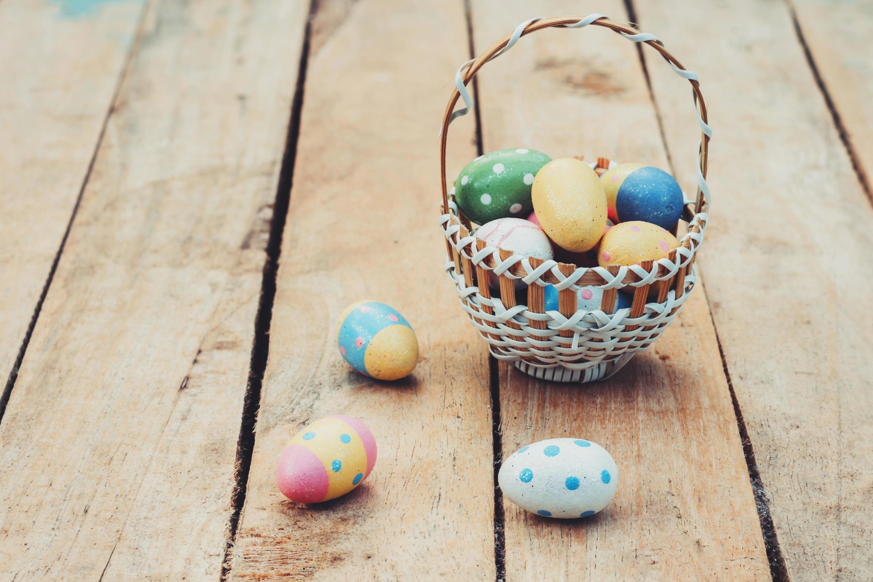 colourful easter egg and basket on wood background 20700829 Stock Photo
