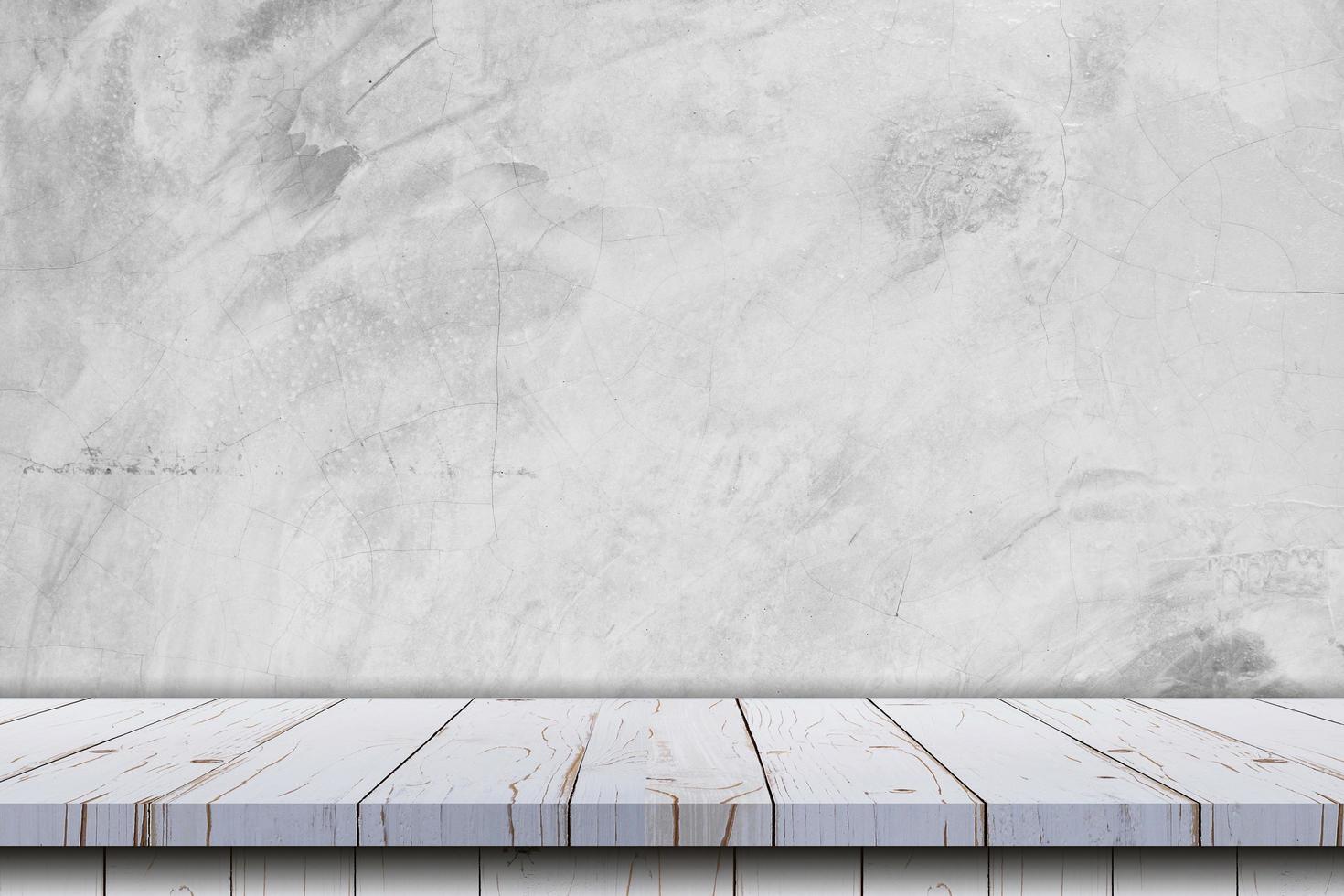 vacío blanco de madera mesa y hormigón pared textura y antecedentes foto