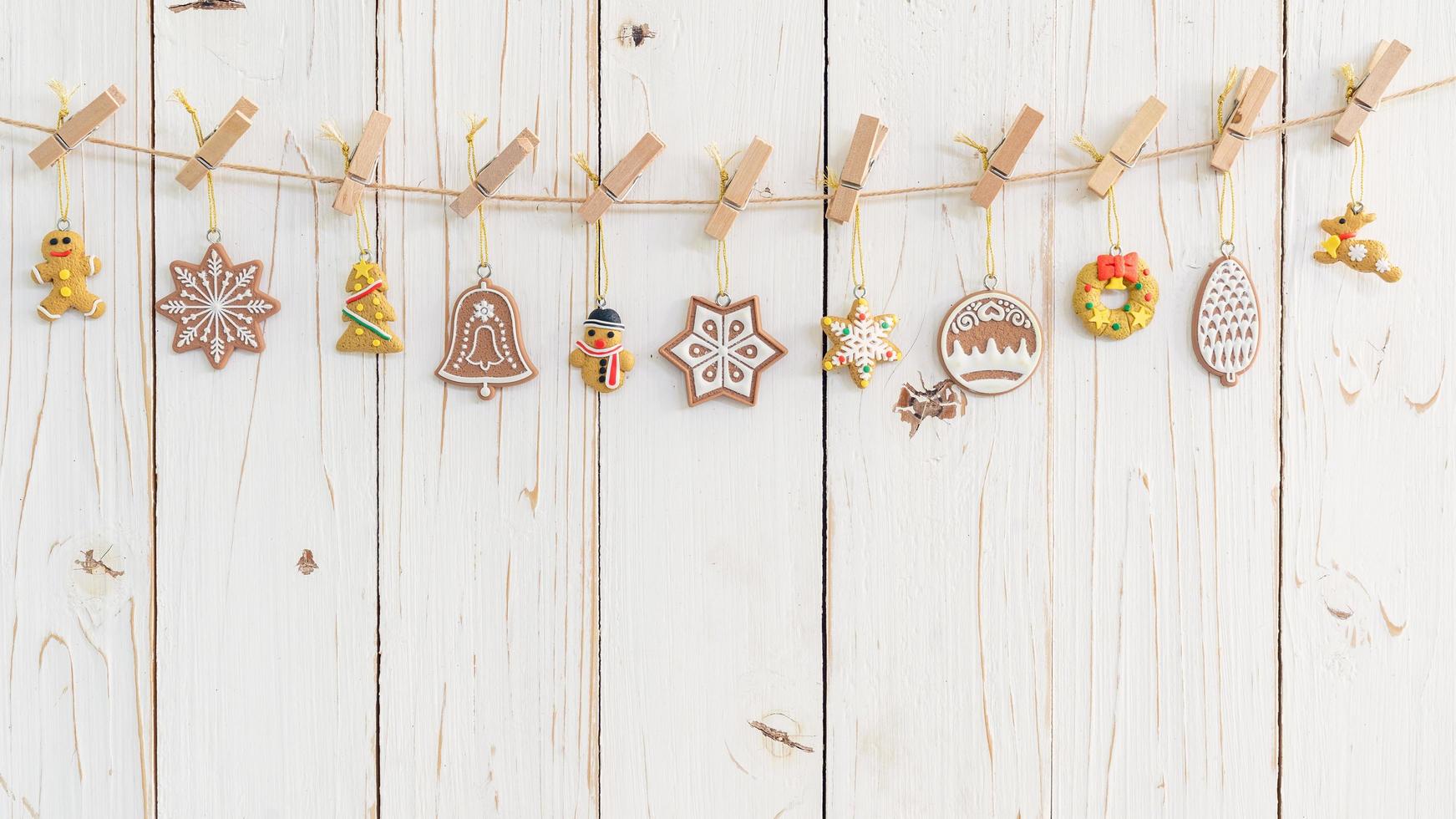 Ornamental christmas decoration hanging on wooden for christmas background with space photo