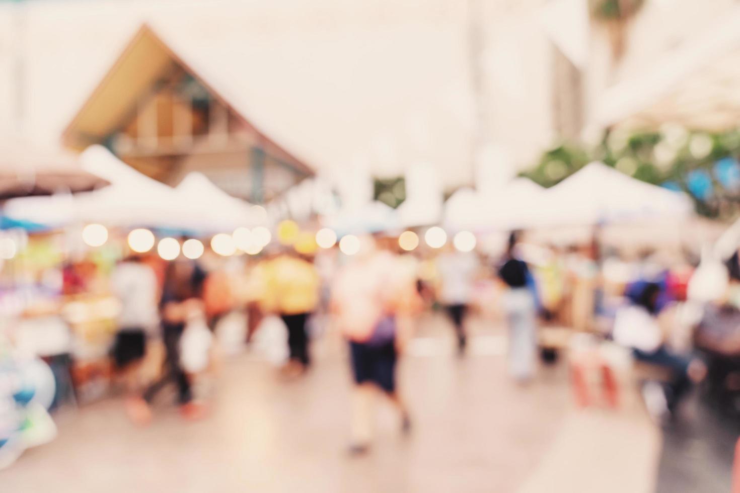 Abstract blur background crowd people in shopping mall for background, Vintage toned. photo