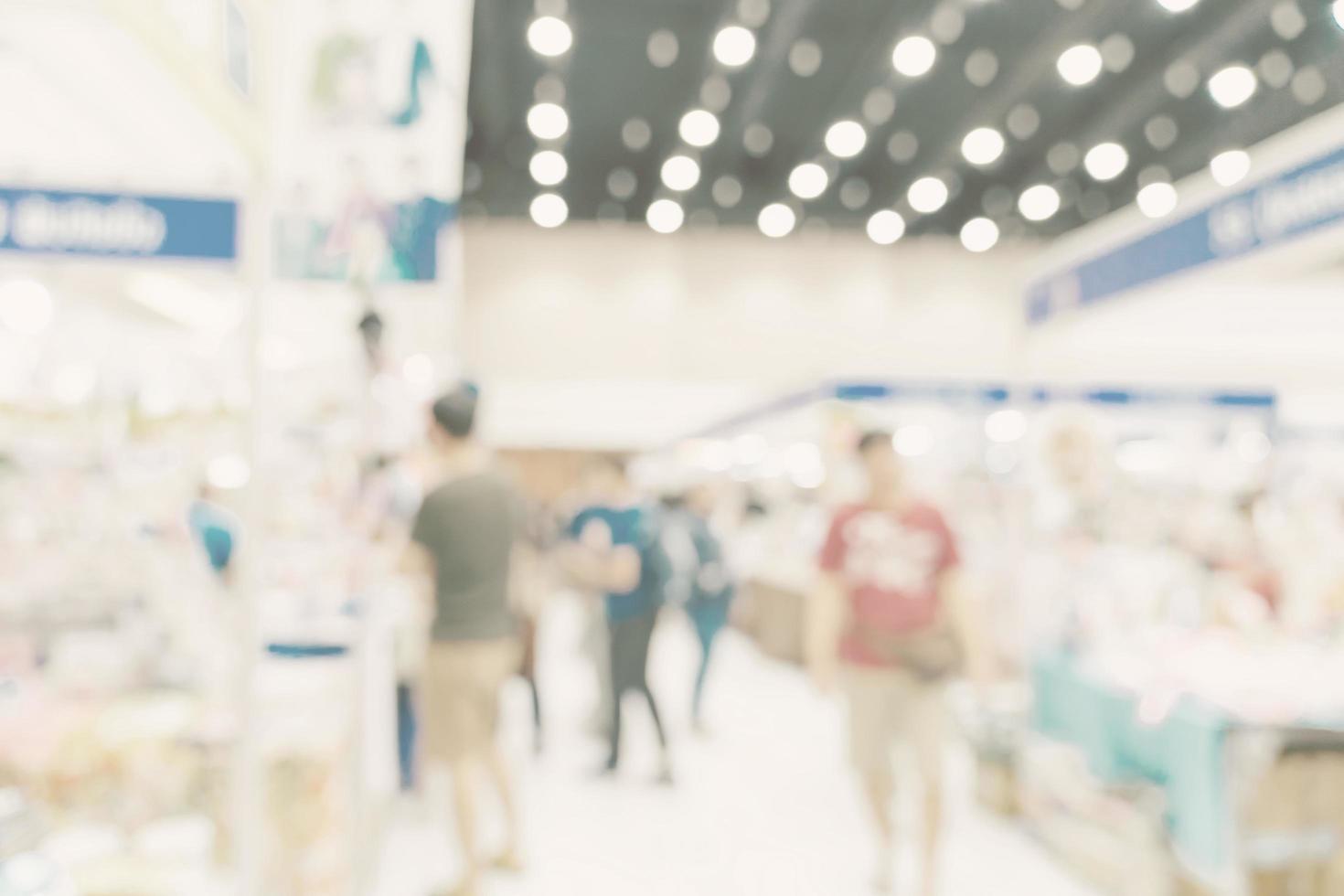 Abstract blur background crowd people in shopping mall for background, Vintage toned. photo