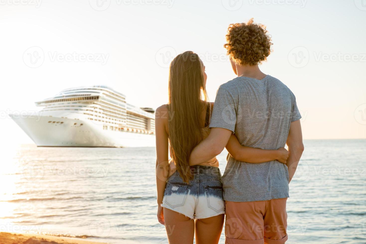 Happy smiling couple who travel by cruiseship. Concept of holiday and summertime photo