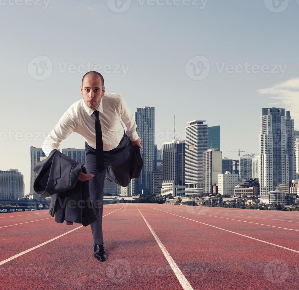 Businessman acts like a runner. Competition and challenge in business concept photo