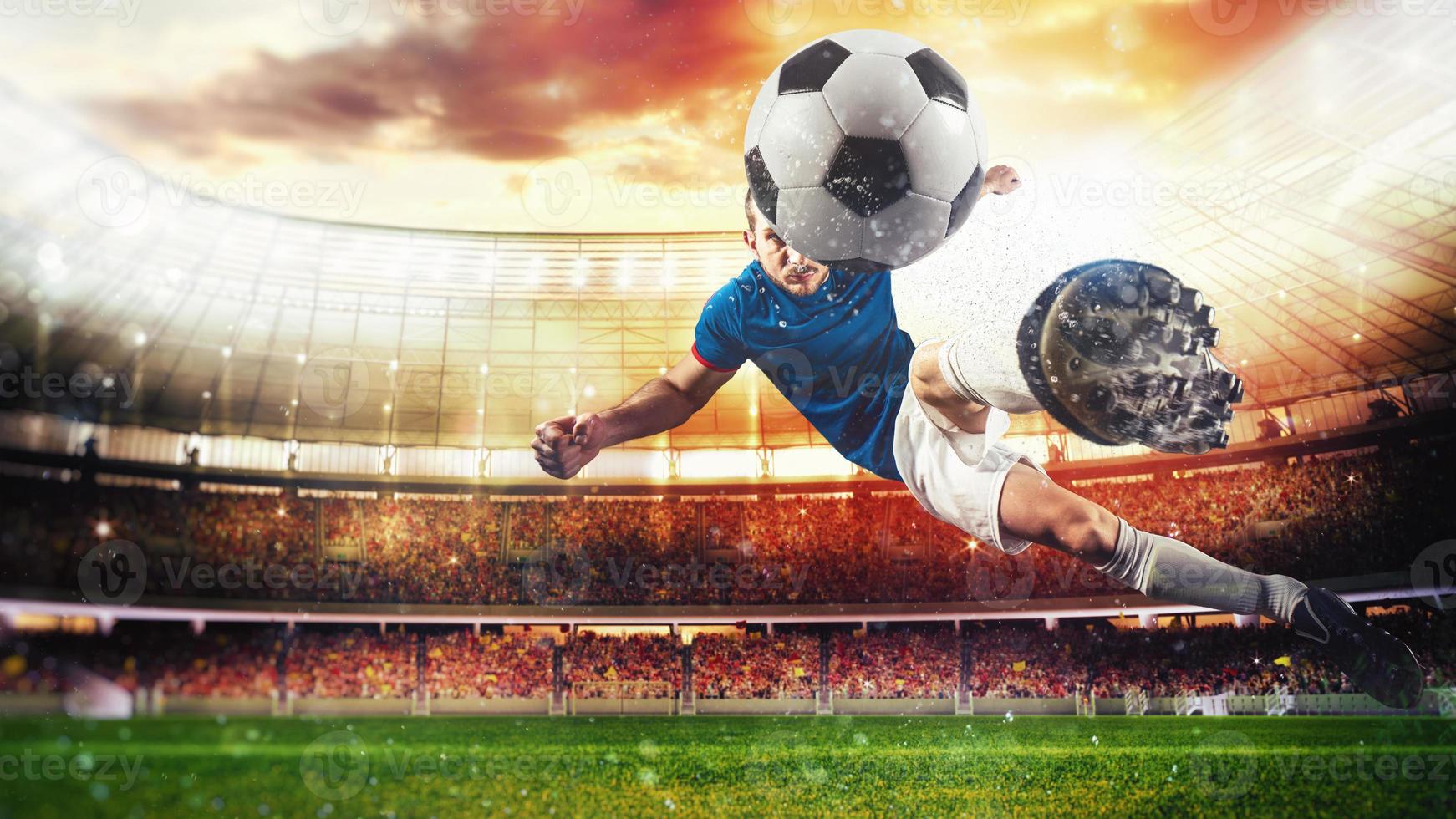 Soccer striker hits the ball with an acrobatic kick in the air at the stadium at sunset photo