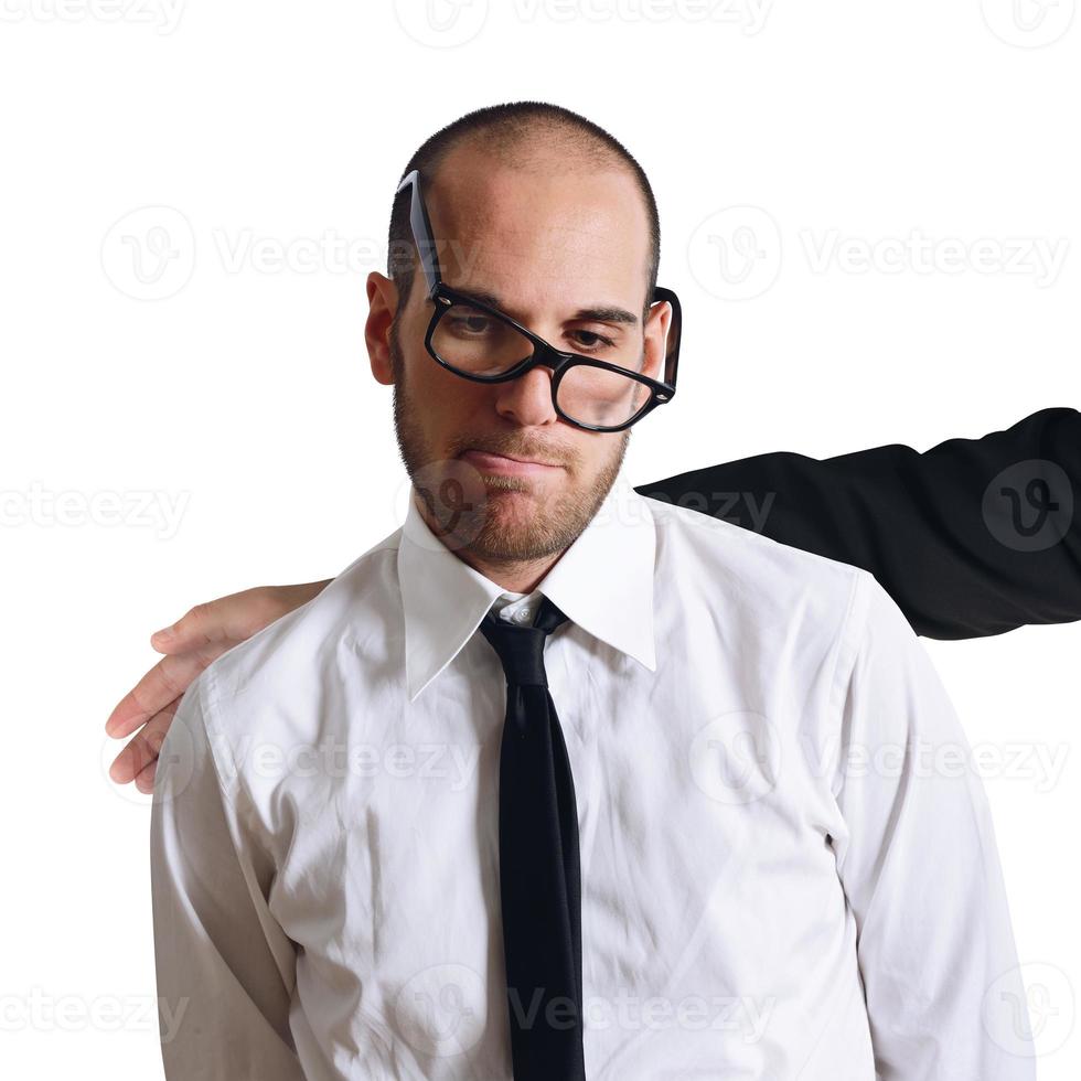Sad businessman comforted photo
