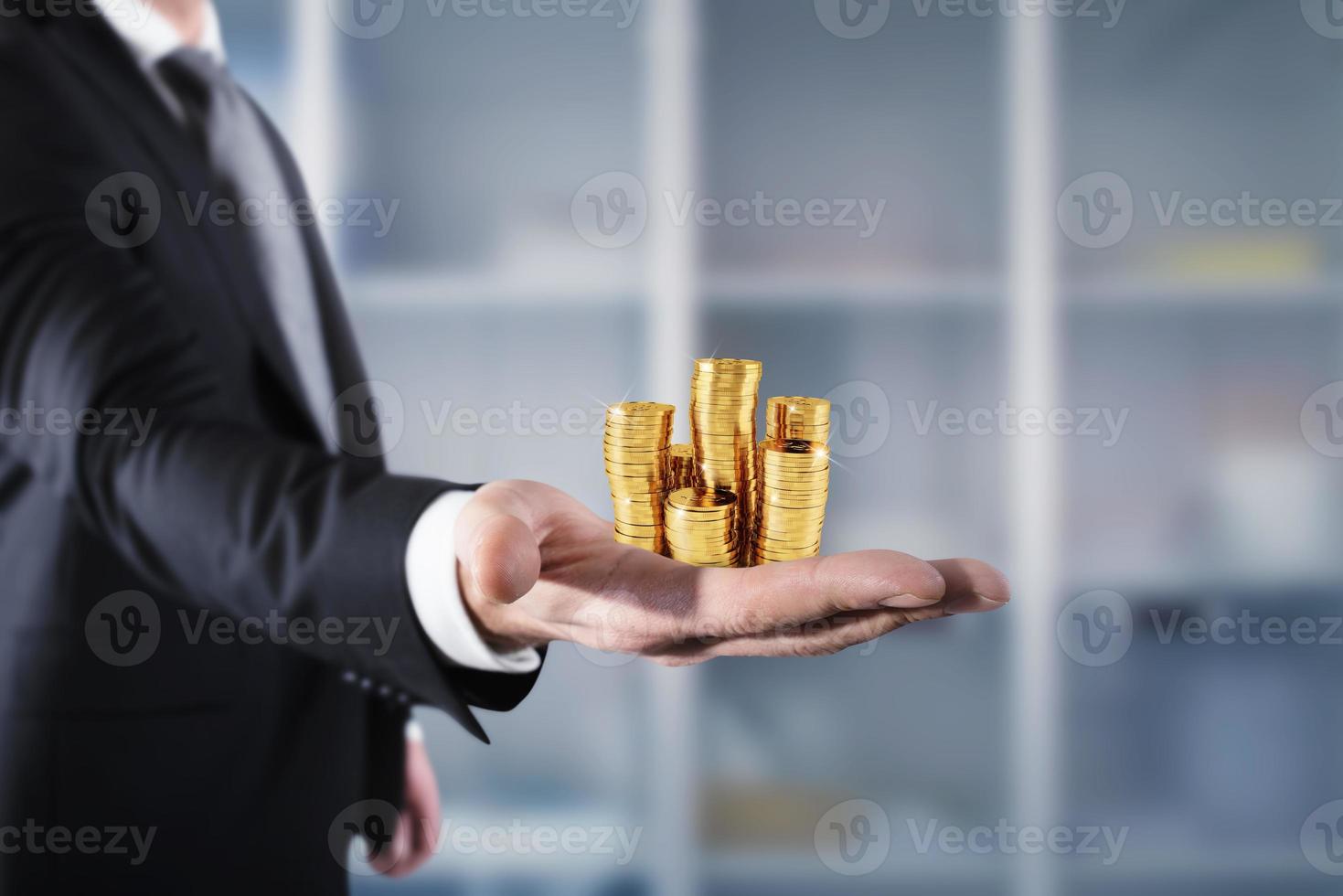 Businessman hold piles of money. Concept of success and company growth photo