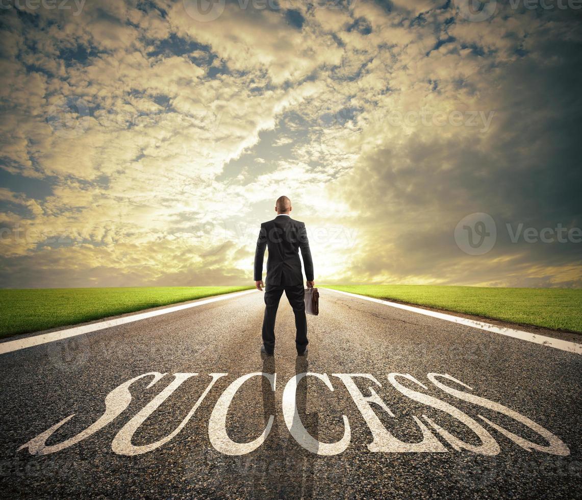 Man walks on a success way. Concept of successful businessman and company startup photo