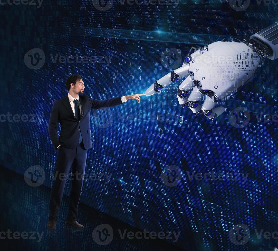 Man machine interaction between human and a digital hand photo