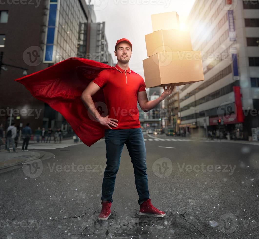 Courier acts like a powerful superhero in a city with skyscrapers. Concept of success and guarantee on shipment photo