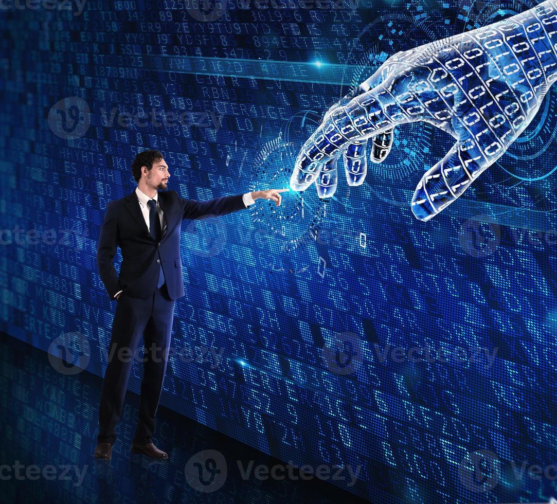 Man machine interaction between human and a digital hand photo