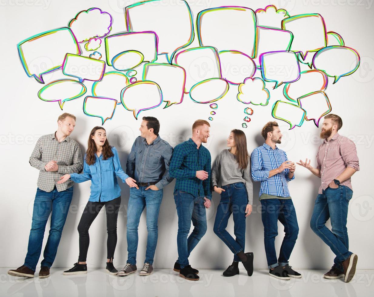 Group of boys and girls speak talking to each other. Concept of social people photo