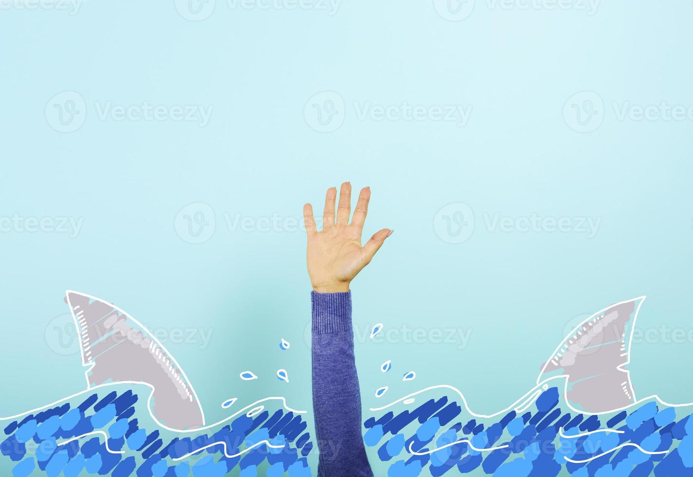 Person surrounded by sharks is drowning and needs help. concept of crisis and problem photo