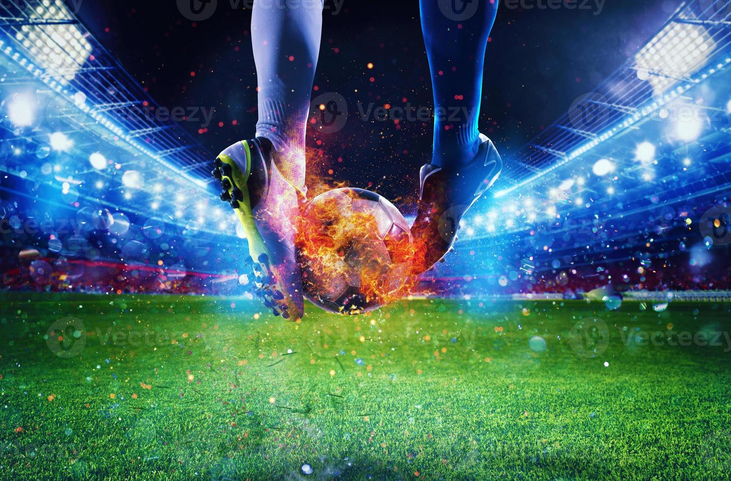 Soccer players with soccerball on fire at the stadium during the match photo