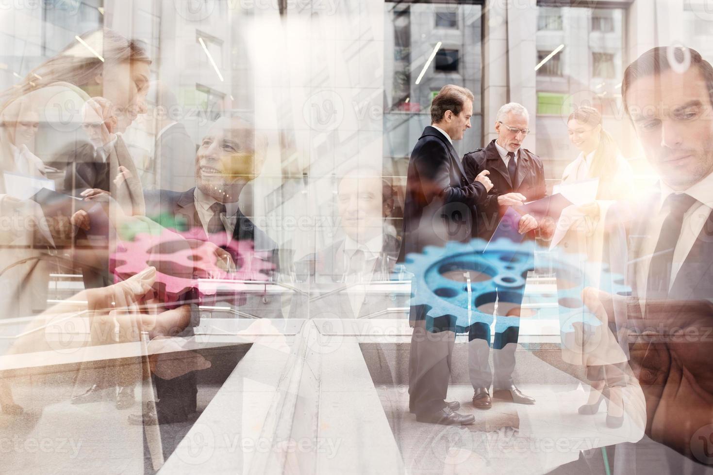 Business team connect pieces of gears. Teamwork, partnership and integration concept. double exposure photo