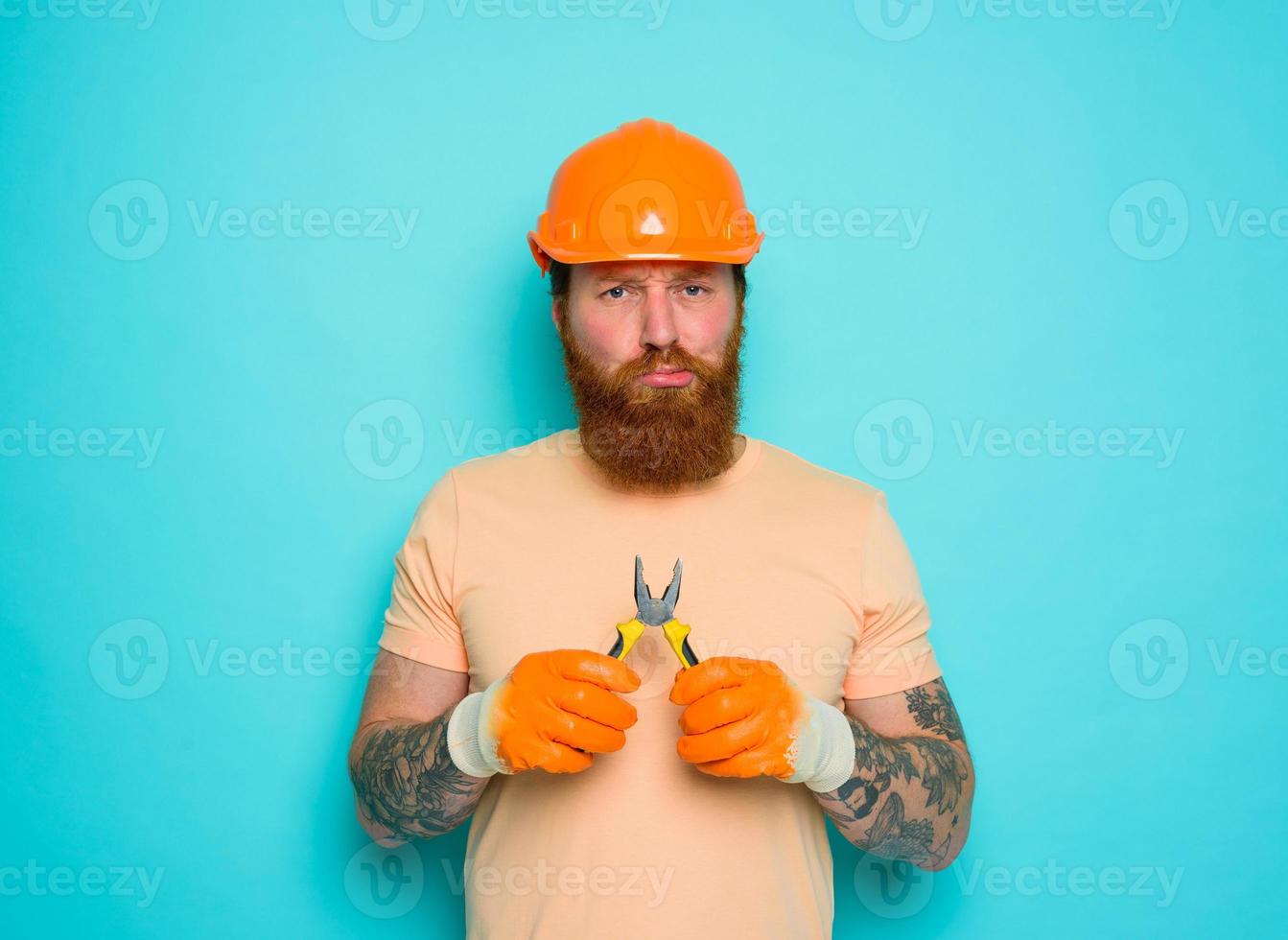 Incompetent worker is unsure and confused about his work photo