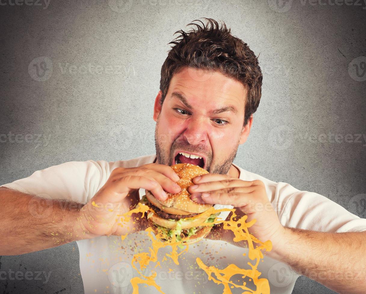 comiendo con violento impetuosidad foto