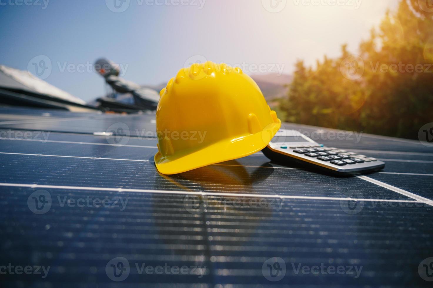 Renewable energy system with solar panel on the roof photo