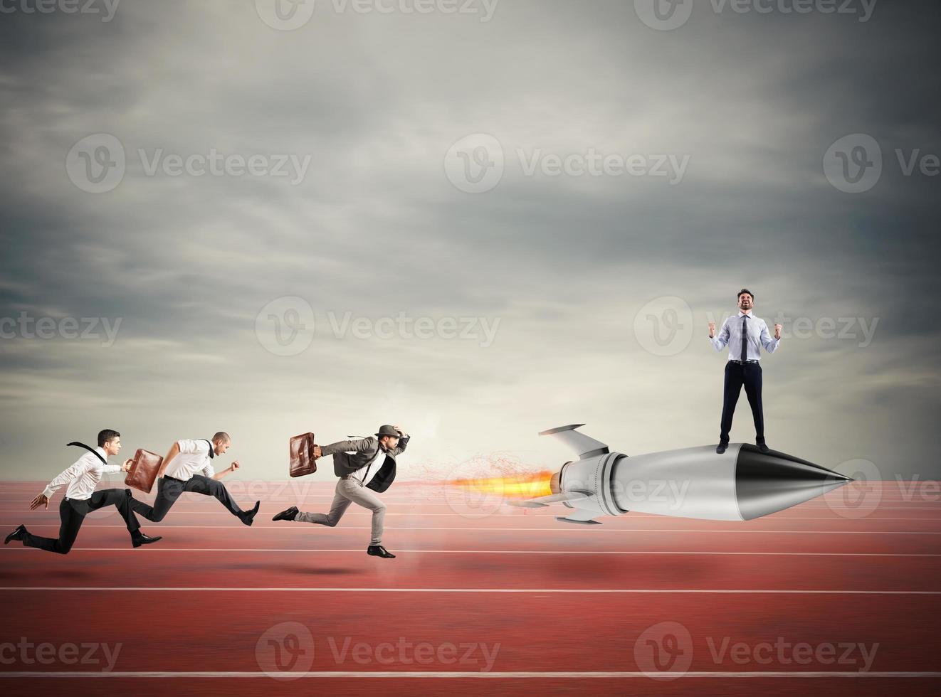 Winner businessman over a fast rocket. Concept of business competition photo