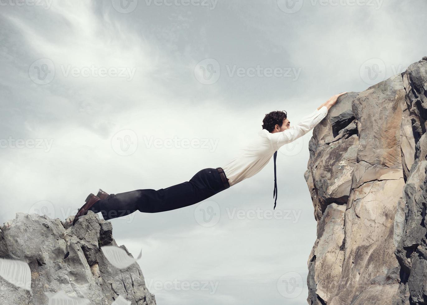 Brave Businessman as a bridge photo