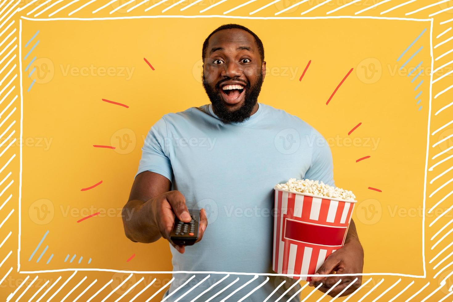 Boy has fun watching a film. Concept of entertainment and streaming tv. red background photo