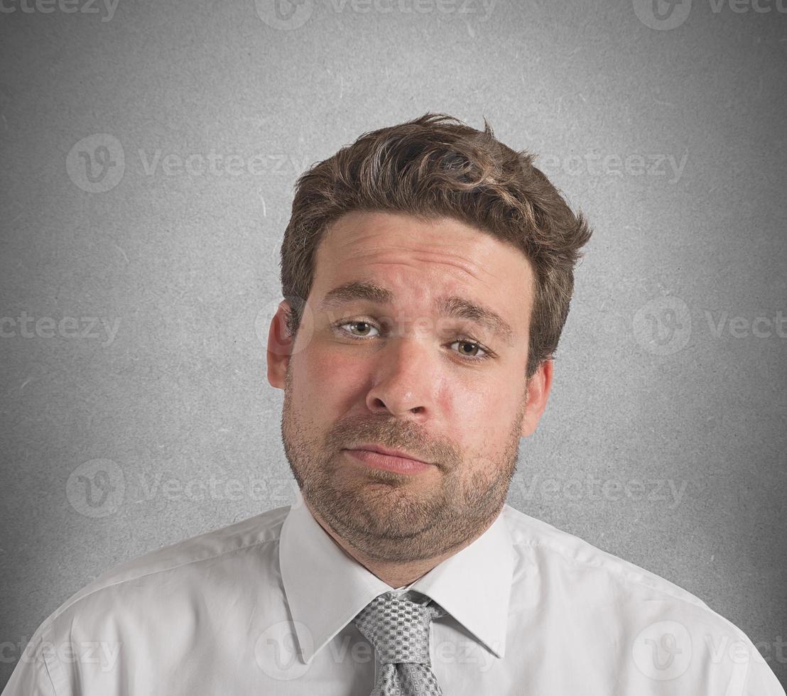 Businessman upset and stressed out from work photo