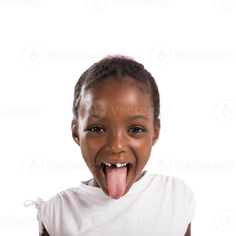 Little girl makes a tongue photo