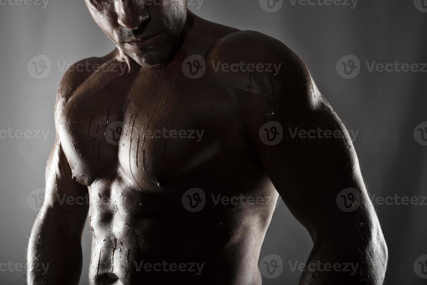 Muscular of a body building trainer man photo