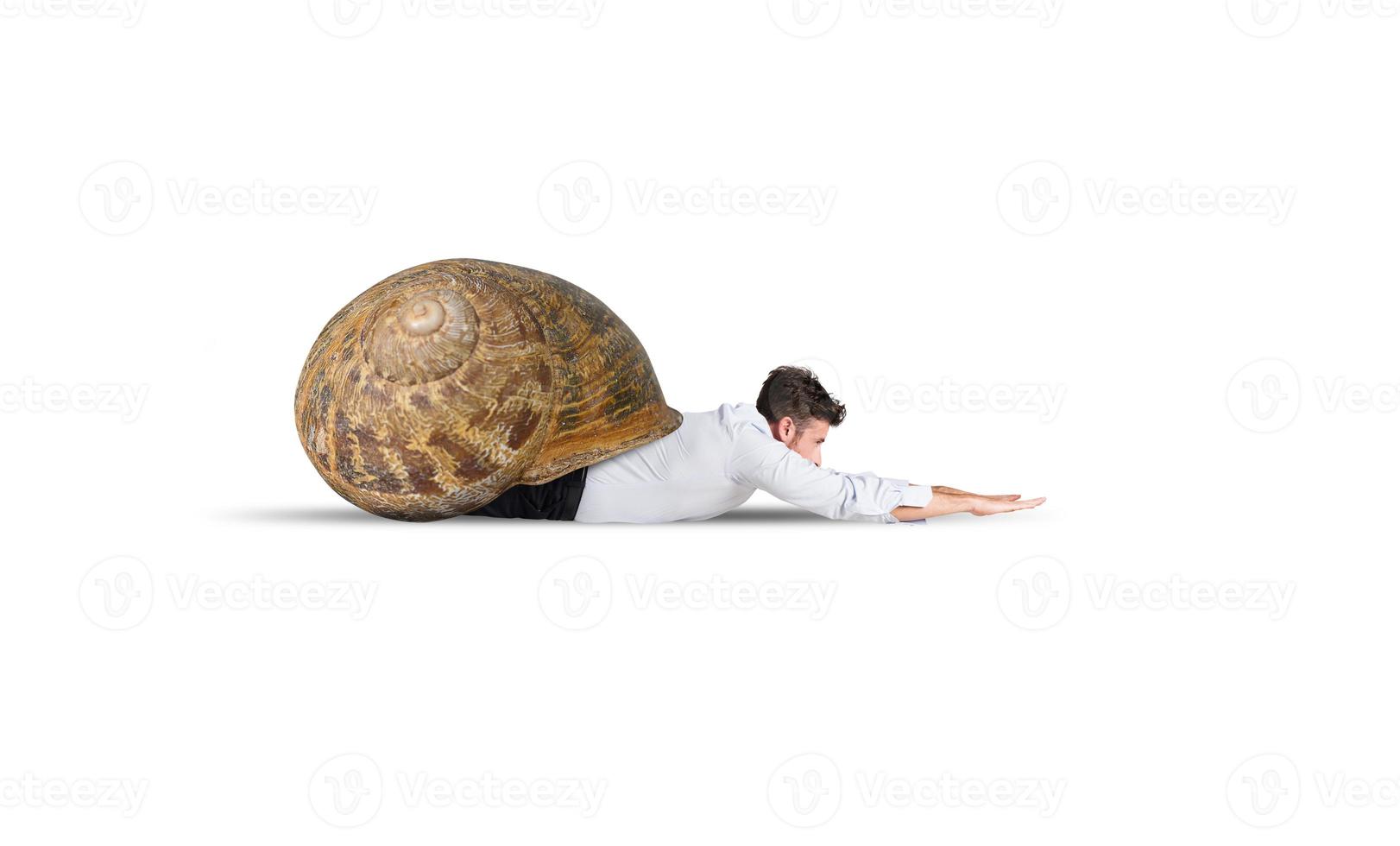 Tired businessman acts like a slow snail photo