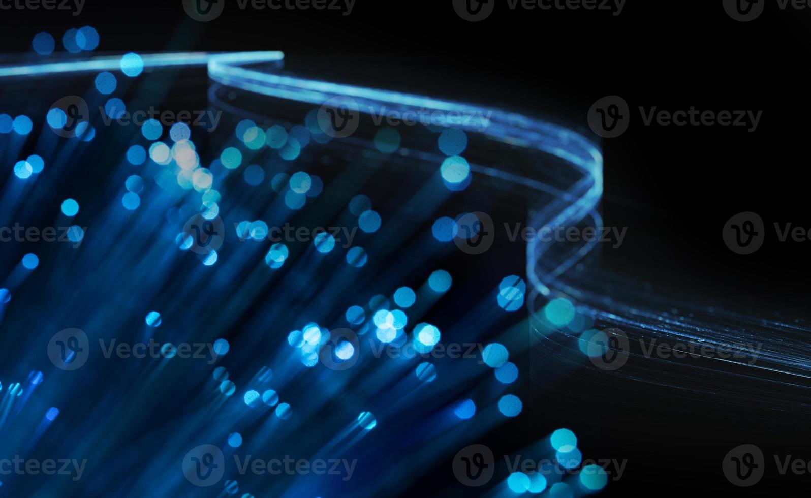 Abstract blue internet background with optical fiber light. photo