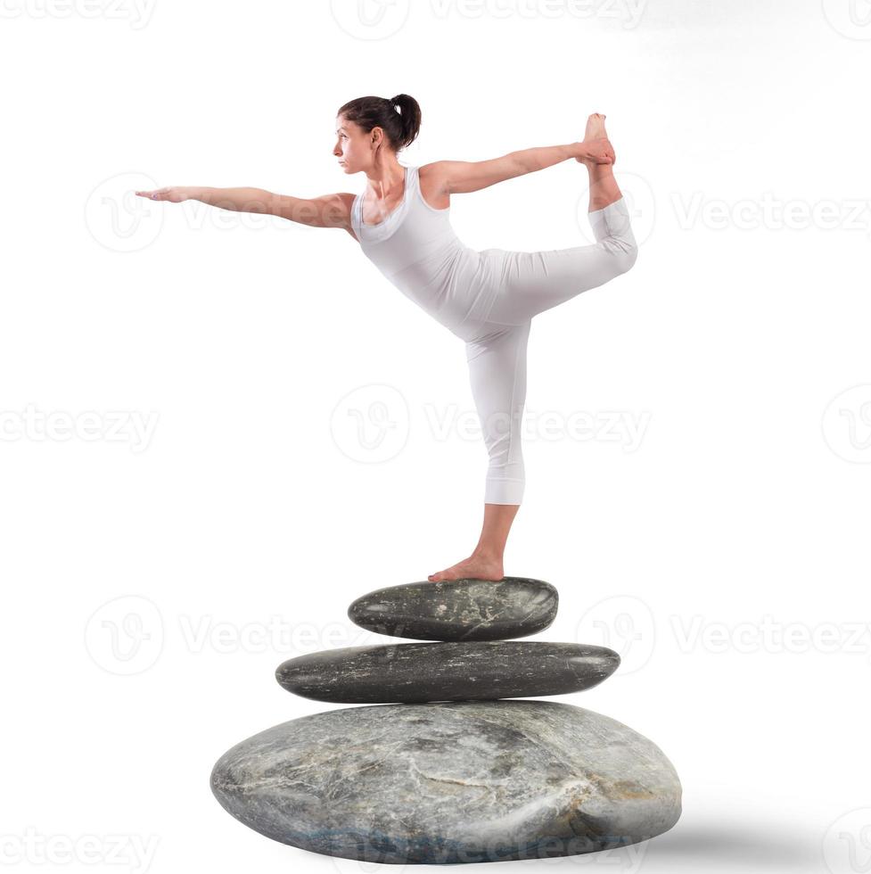 Pilates position on rock photo