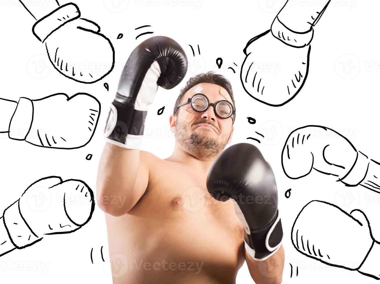 Goofy boxer man hit by many punches photo