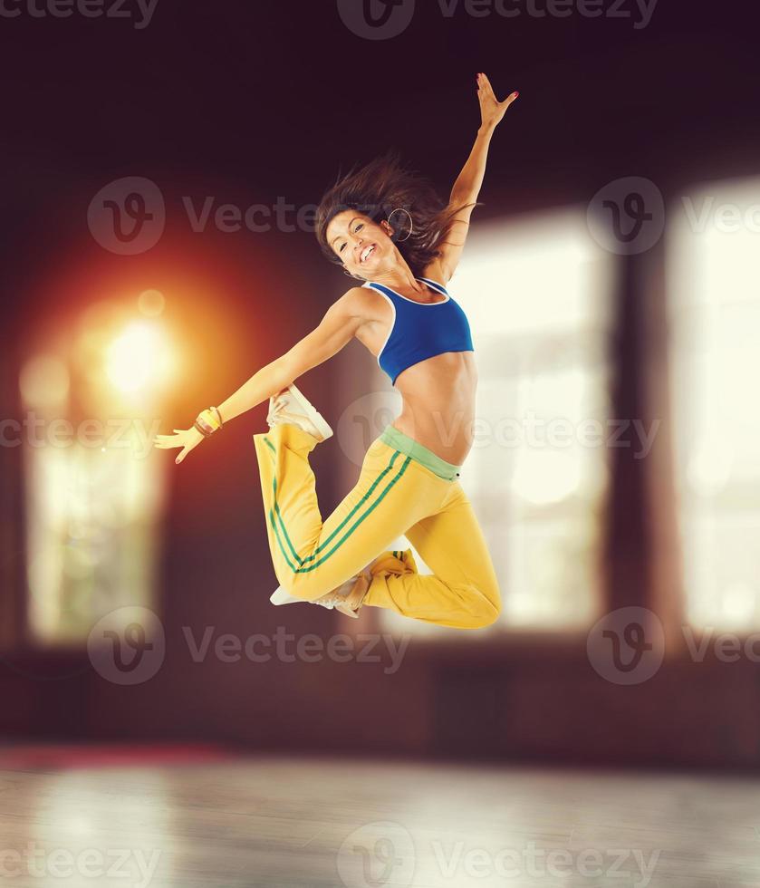 Happy girl has fun during the workout photo