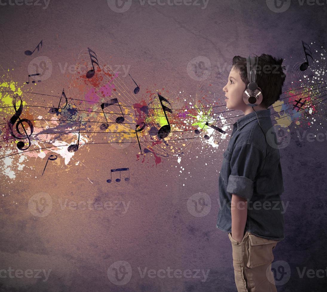 Young boy listening to music photo
