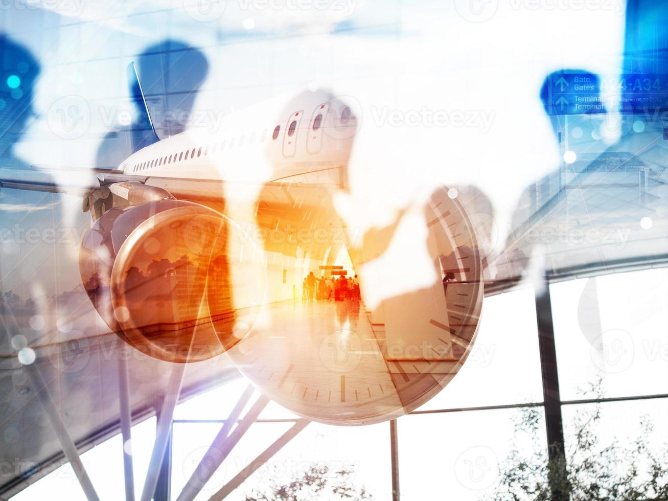 Take off of a modern aircraft and double exposure with silhouettes of passengers in the airport photo